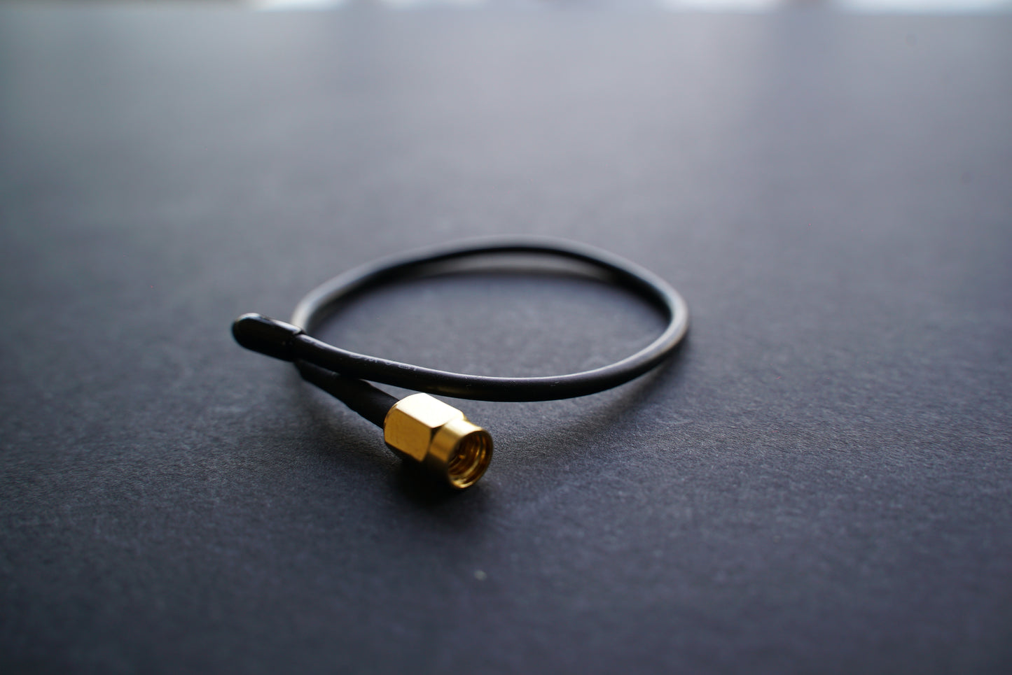 Flexible antenna for transmitters with SSMA connectors