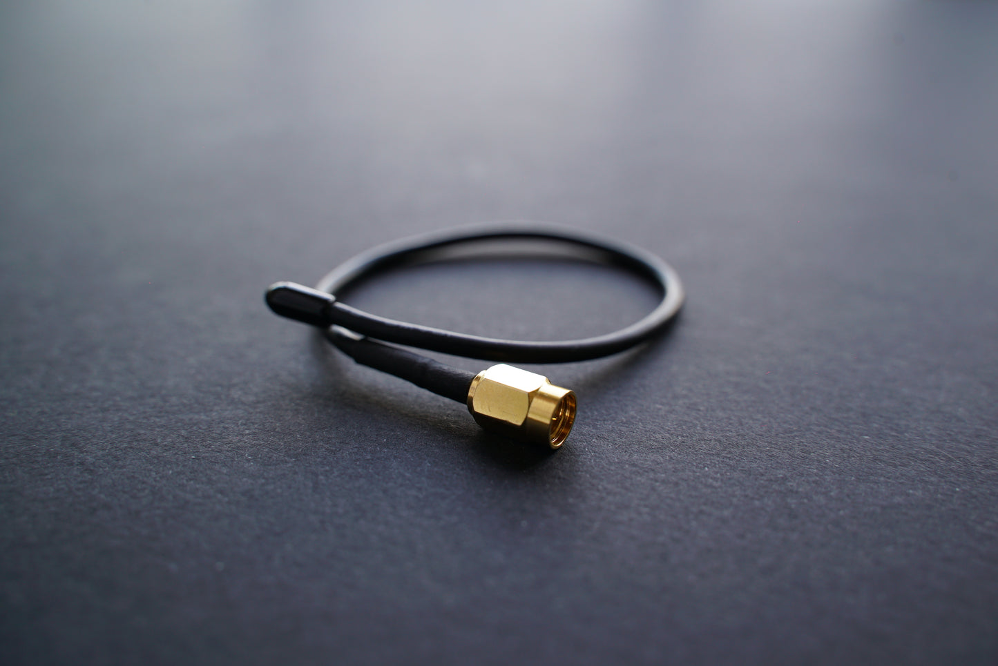 Flexible antenna for transmitters with SSMA connectors